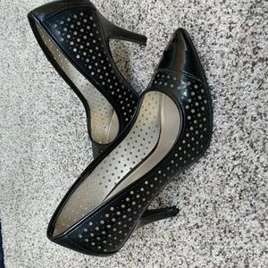 Women's black heels with cutout pattern